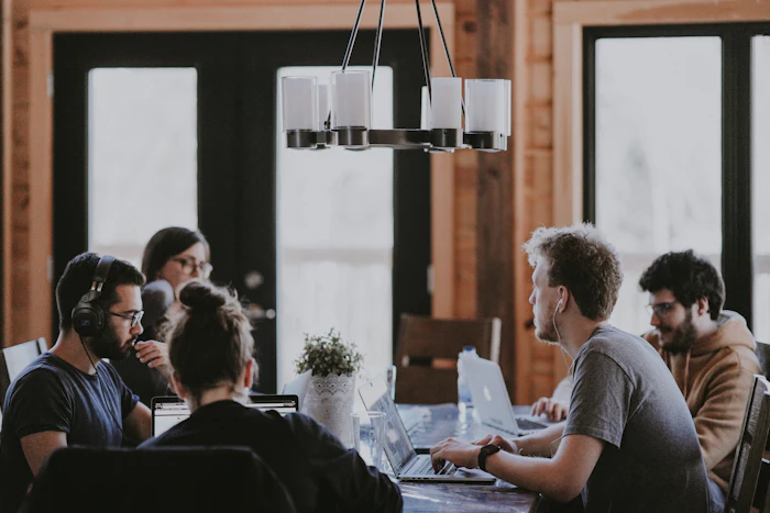 Professional team collaborating around a table